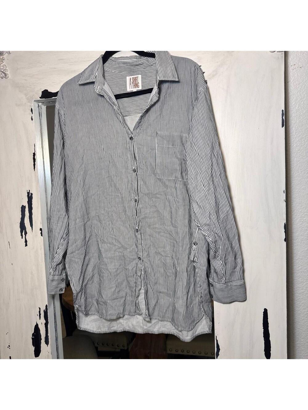 A shirt Thing Button Down shirt size M/L